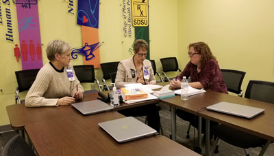 Case Management Director Lynne Thompson, RN; Case Manager Sheila Helms, RN; and Hospitalist Dr. Catherine Leadabrand discuss patient treatment plans at Brookings Hospital’s inpatient care unit. Teamwork between employees has fostered Brookings Health System’s recent recognition with a 2018 NOSORH Performance Leadership Award for overall excellence in quality and outcomes. The award reflects top quartile performance among all rural hospitals I the nation.