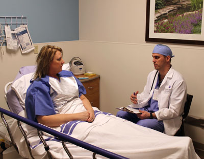 Anesthesia Director Brian Kvamme, CRNA, visits with a patient about Enhanced Recovery After Surgery (ERAS) protocol prior to having a major surgical procedure at Brookings Hospital. ERAS is based on evidence-based best practices and medical science to help patients recover as quickly as possible after undergoing a major surgery by treating the underlying cause of surgical pain, inflammation. It uses the best combination of medication to treat a patient’s pain with minimal to small use of opioid medications.