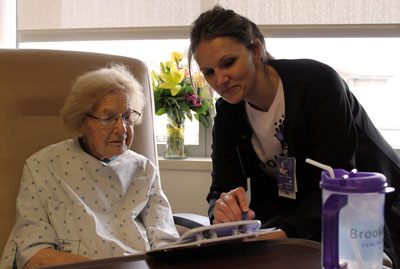 Inpatient Care Nurse Kim Gray covers hospital discharge instructions with Arloine Goodfellow before she returns home. Brookings Health System was named a Top 20 Rural Community Hospital by the National Rural Health Association and scored in the top two percent of all rural community hospitals in the nation. The health system will be recognized during the Rural Hospital Innovation Summit on May 9 in Atlanta.
