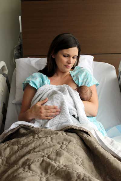 Mother Tara Hendricks of Brookings feeds her baby boy, Wyatt, at Brookings Health System’s OB unit, New Beginnings Birth Center. The health system was one of the first hospitals in the nation to complete the CDC-funded EMPower Training initiative which teaches safe implementation of maternity care practices to support optimal infant nutrition, including breastfeeding. The training reinforces the policies and practices Brookings Health System has in place as a Baby-Friendly Designated hospital.