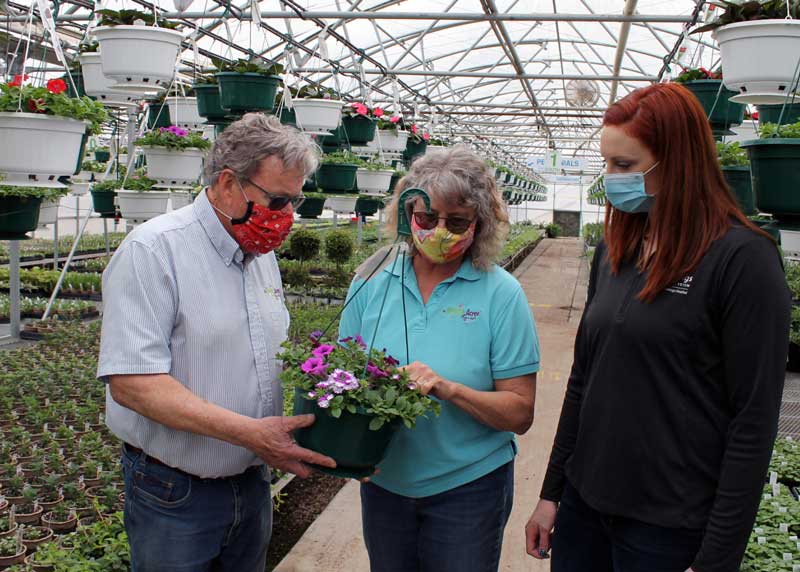 Medary Acres Greenhouse Owners Brian and Lynn Darnall show Brookings Health System Foundation Director Sara Schneider the arrangement planted in one of their mixed hanging flower baskets that will be available for pickup as part of this year’s Flower Fundraiser. In addition to hanging baskets, individuals may also order deluxe patio pots or special flower tins; a portion of the proceeds will go toward the Foundation. Fundraiser orders may be placed now until April 26 by calling (605) 696-8855 or visiting brookingshealth.org/Flowers.