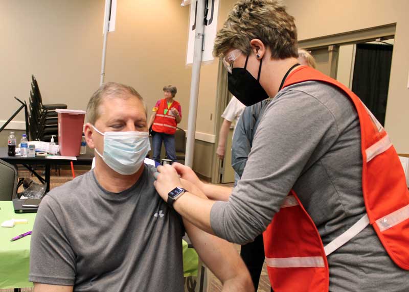 McKenzie Nielsen, RN, prepares Tony Brallier’s arm to receive a Janssen vaccine at the free, walk-in community vaccination center held on April 29. The Brookings County PPCC will hold two more walk-in community vaccination centers on May 13 and 20 at the Swiftel Center, offering the single-dose Janssen vaccine to recipients. 