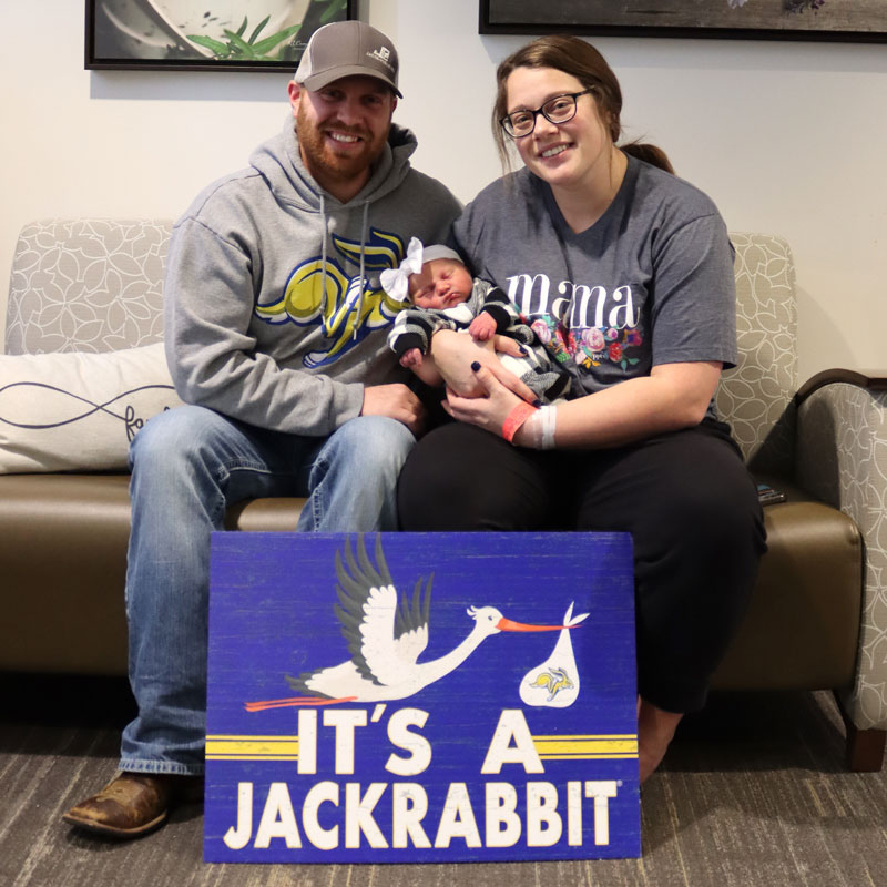 Shelby and Kelin Rang hold their championship baby, Bailey. Bailey was born at 4:06 p.m. on Jan. 8 at Brookings Health System, just as the South Dakota State football team officially became FCS college football champions.