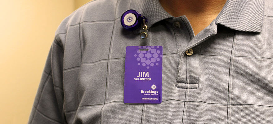 close up of volunteer wearing name badge