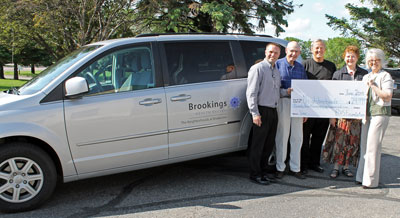 Brookings Health System’s 2013 “Make This House a Home” campaign raised money to support The Neigbhorhoods at Brookview, including a recently purchased handicap accessible van. Pictured from left to right: The Neighborhoods at Brookview Administrator Jason Hanssen, Foundation Board of Trustees Member Bruce Lushbough, Foundation Board of Trustees Member David Kneip, Foundation Board of Trustee Chair Roberta Olson and Foundation Development Officer Barb Anderson. 