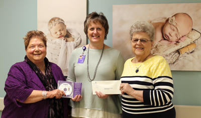 Brookings Healthcare Auxiliary President Patty Porter (left) and Treasurer Ruth Hevle (right) present a check to OB Director Mary Schwaegerl (center) to continue funding for The Period of Purple Crying, a program designed to help prevent shaken baby syndrome. Thanks to the Auxiliary’s donation, all new parents who deliver at Brookings Health System will continue to receive The Period of Purple Crying DVD and booklet as a free gift. 