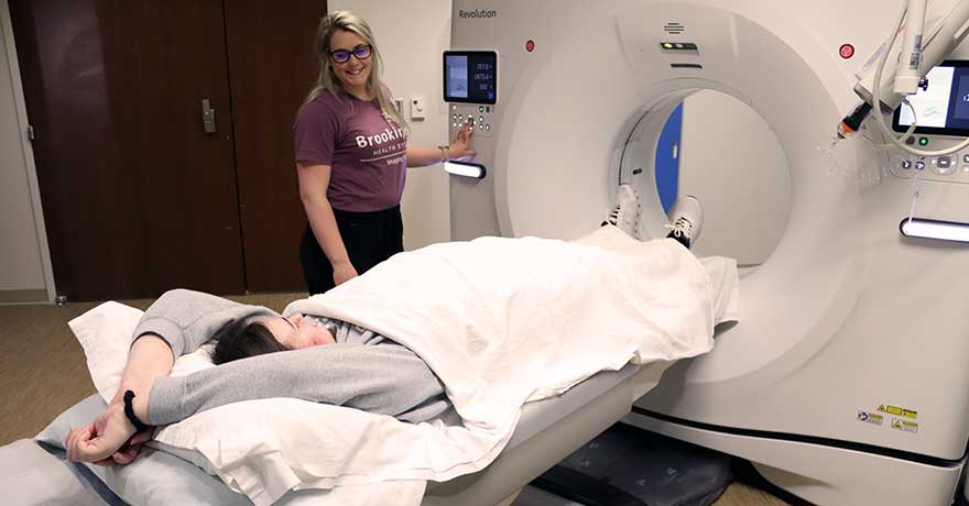CT Technologist setting up a patient for a CAT scan