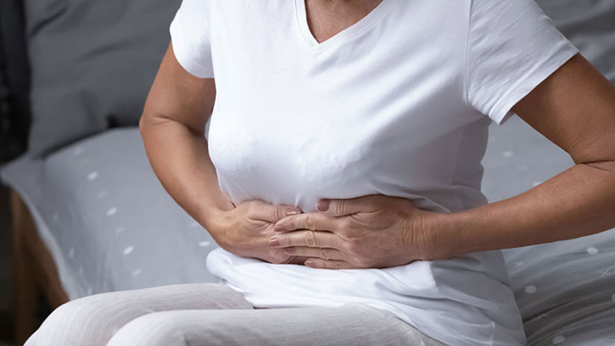 Woman having abdominal pain