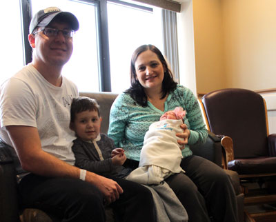 Mayla Irene Petersen was born on New Year’s Day at Brookings Health System. Pictured with Mayla are her parents, Jason and Stephanie, and big brother Grayden. As the first baby of the New Year, Mayla and her family received a variety of gifts from local businesses and organizations.