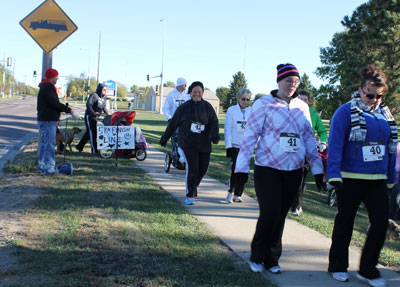 Participants from last year’s Community Wellness 5K Fun Run-Walk begin the race from across the Hy-Vee parking lot.