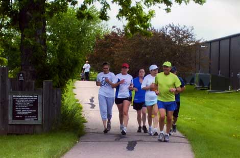 Participants from last year's Community Wellness 5K Fun Run-Walk sprint on the bike paths in Brookings.