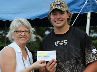 Hunter Newman took home the top prize in the youth category at the Brookings Health System Foundation’s sporting clays fundraiser. He is pictured here with Foundation Development Officer Barb Anderson. 