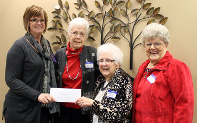 Brookings Healthcare Auxiliary recently donated $1,500 to Brookings Health System’s Home Health and Hospice programs to purchase a portable patient monitoring system sensitive enough to take the pulse and blood oxygenation level of adults with poor circulation and infants. Above, Brookings Health System Home Services Director Lynne Kaufmann accepts the donation from Auxiliary Recording Secretary June Wiesner, President Marlys Kelsey and Treasurer Ruth Hevle.