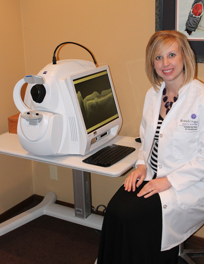 Optometrist Dr. Trisha Morehouse uses the new OCT machine, a non-contact, high resolution imaging device used to detect and manage various ocular diseases.
