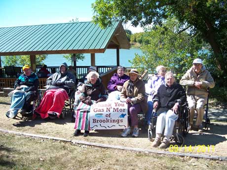 Brookview Manor residents on the annual fishing trip to Oakwood Lake. Back row, from left: Jerry Ward, Norman Gambill, Paul Carson, Dorthy Elyea, Marj Hendricks, Gordon Knutson. Front row, from left: Marie Mathison, Fern McKeown, Electa Neagel.