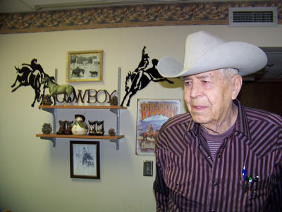 Honorary Campaign Chair Ray LaRoche stands next to his western décor in his room at Brookview Manor. This summer, LaRoche and all Brookview Manor residents will move to The Neighborhoods at Brookview. Funds raised from the “Make this House a Home” campaign will help purchase added amenities for the new skilled nursing facility, improving the quality of life for residents like LaRoche.